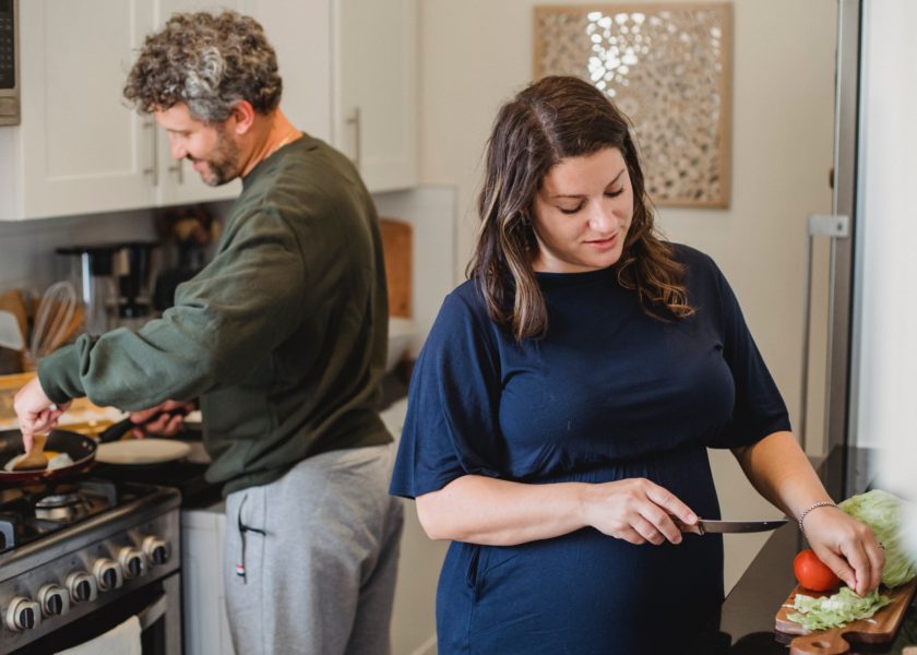 parents cooking and thinking about diet and fertility